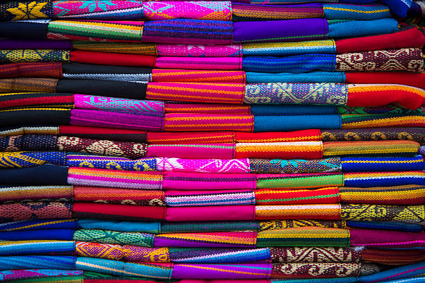 Colorful Fabrics at Otavalo market in Ecuador. stock photo