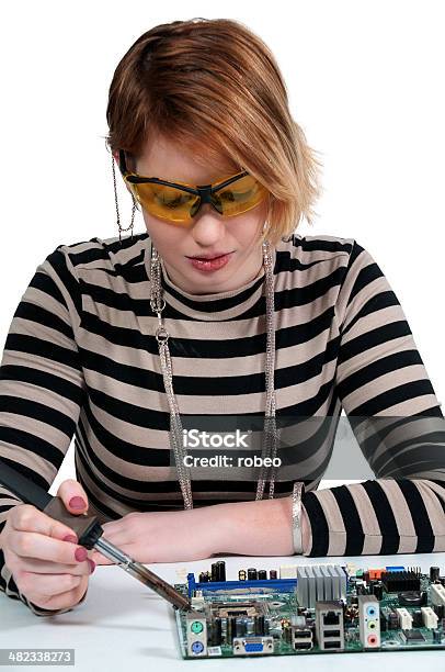 Woman Soldering Stock Photo - Download Image Now - Adult, CPU, Circuit Board