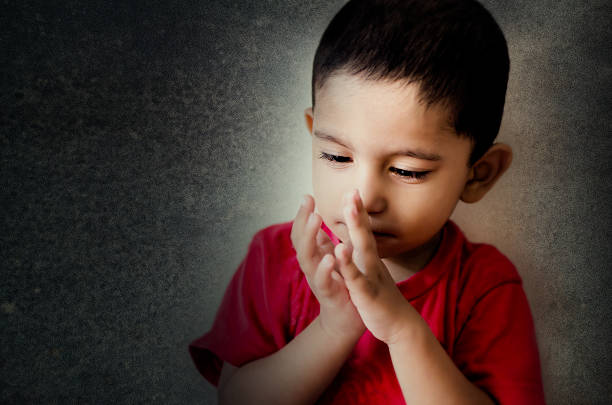 istock little child playing with fingers 482341962
