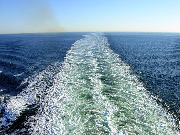 istock Waves and exhaust gases from a ship 482342020