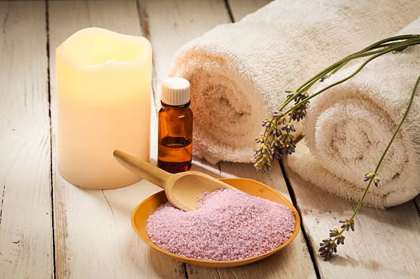 istock lavender bath ingredients, candle and towels 482344344
