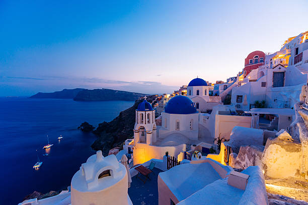istock Famous Santorini blue domes at night 482344528