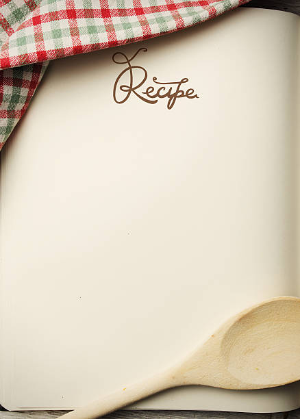 istock Blank recipe book on wooden table 482344730