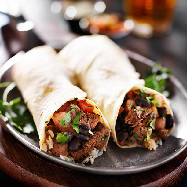 istock steak and rice mexican burritos 482344858