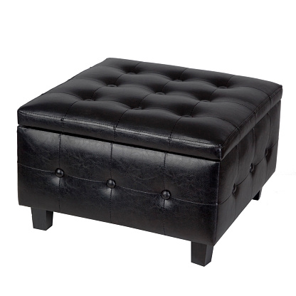 Leather footstool in leather isolated on white