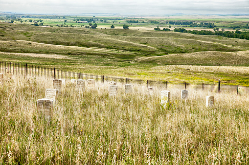 Gravestones in the cemetery look out over the battlefield at Little Bighorn in Montana where General George Custer's 7th Cavalry and the Lakota Sioux fought a fierce battle in 1876.