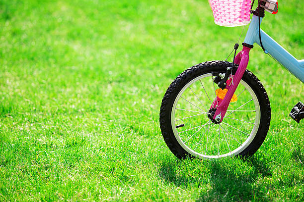 istock Children's bicycle on green grass, close up photo 482350718