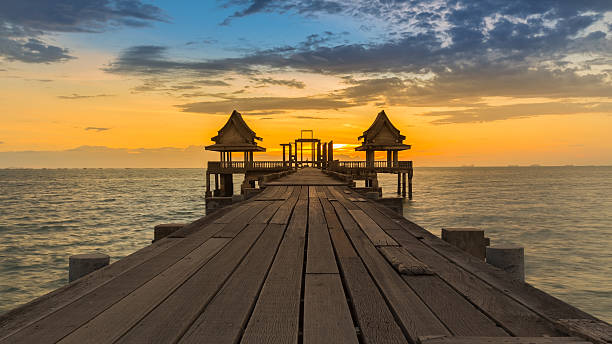 istock Wooden Bridge and Pavilion leading into sea 482350946
