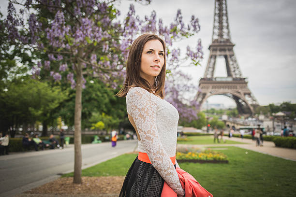 istock Tourist young woman at eifel tower Paris 482352002