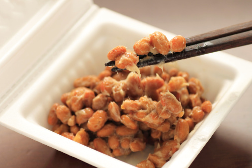 a container of natto(fermented soy beans) on  the  table
