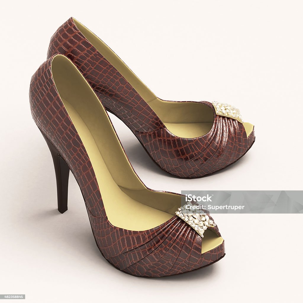 Crocodile leather women's shoes with high heels Crocodile leather women's shoes with high heels close up on a light background Alligator Stock Photo