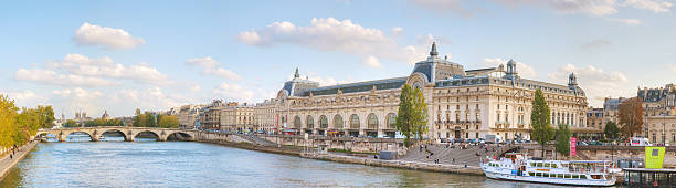 D'Orsay museum building in Paris, France Paris, France - October 9, 2014: D'Orsay museum building with people in Paris, France. The Musee d'Orsay is a museum in Paris, on the left bank of the Seine. musee dorsay stock pictures, royalty-free photos & images