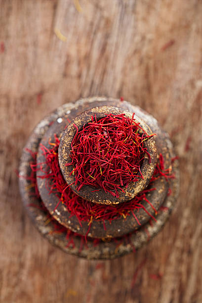 istock saffron spice in antique vintage iron bowls weights 482360100