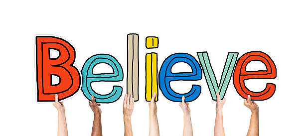 istock Group of Hands Holding Letter Believe 482360324