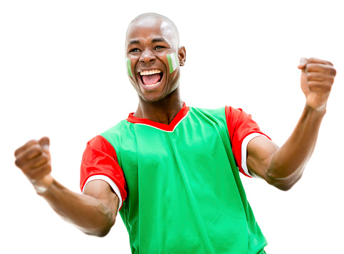 Happy football fan from Nigeria celebrating a goal