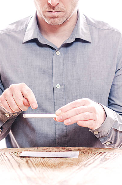 istock Man making a mobile deposit with his cell phone 482361601