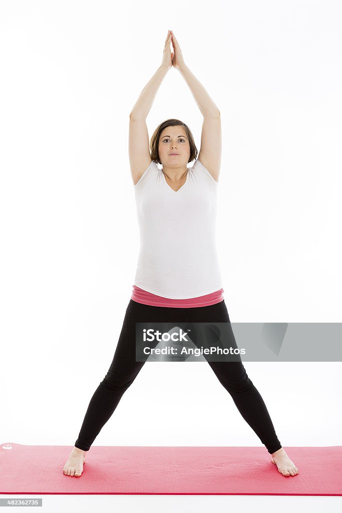 Mujer embarazada practicar yoga - Foto de stock de Actividades y técnicas de relajación libre de derechos