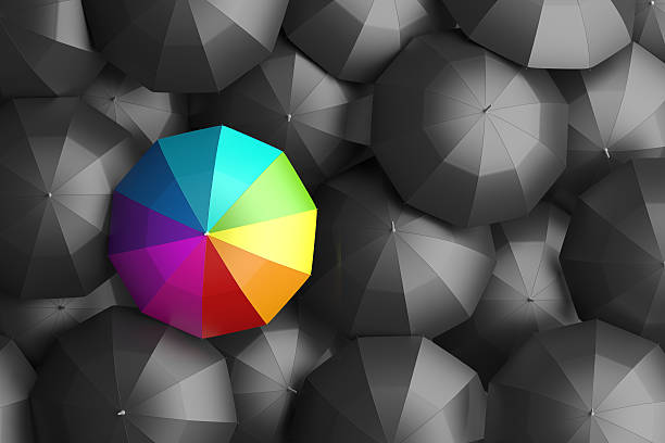 salirse de lo normal - rainbow umbrella descriptive color multi colored fotografías e imágenes de stock