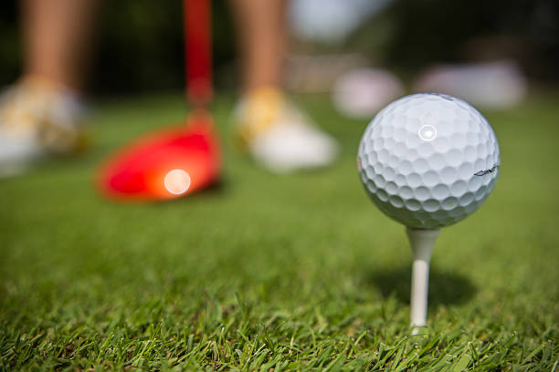 istock Golf ball on grass at golf club or golf course 482364132