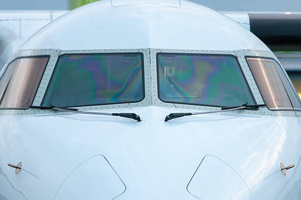 White Cockpit or cabin crew of aircraft witout pilot. Close White Cockpit or cabin crew of aircraft witout pilot. Close-up view. Transportation background witout stock pictures, royalty-free photos & images