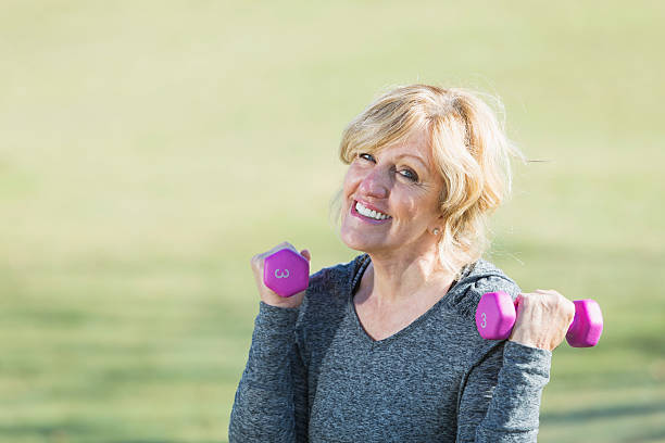 istock Senior woman exercising 482366469