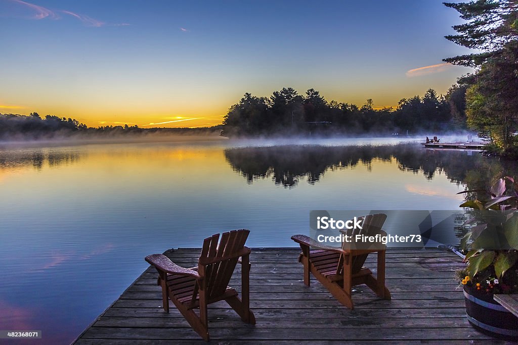 Our Lakeside Lookout A place on the dock to sit and enjoy the view of the lake. Commercial Dock Stock Photo