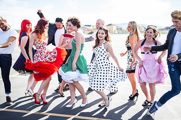 istock Group of Friends Dancing Outside 482369132