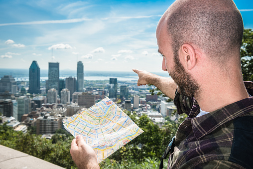 tourist reading a map in Montreal