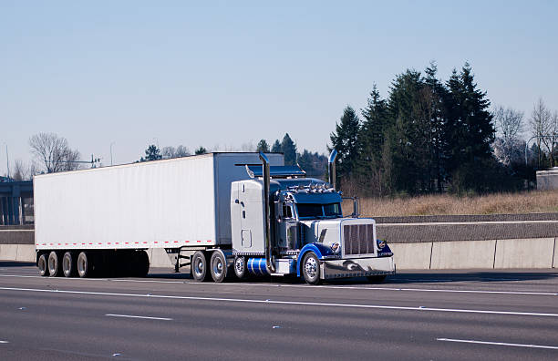 istock Fancy classic chromy bright blue shiny semi truck big rig 482371522