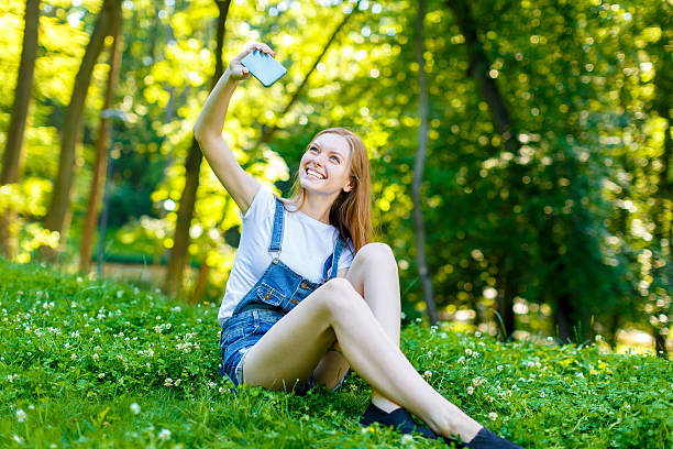 istock Beautiful smiling red-haired young woman 482374048