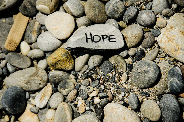 istock `Hope` and positive thinking on the beach 482375198