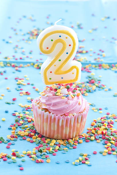istock Little cupcake with pink frosting and sprinkles 482375863