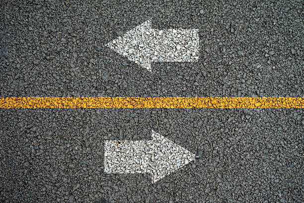 istock Arrow and line on the asphalt roads 482376288