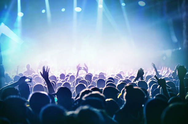 istock People at concert party. 482377664