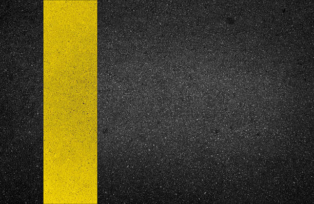 istock yellow line on the road texture background 482380239