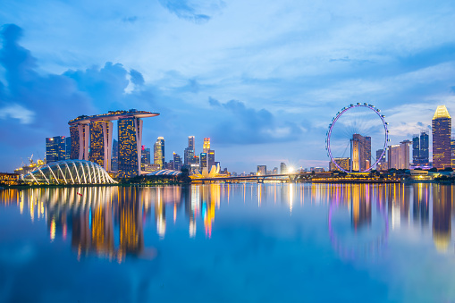 Singapore Skyline and view of Marina Bay at twilight.