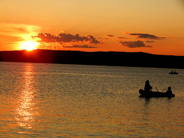 istock Sunset and fishermen 482381522