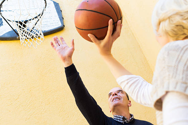 istock Mature couple throwing the ball 482391148