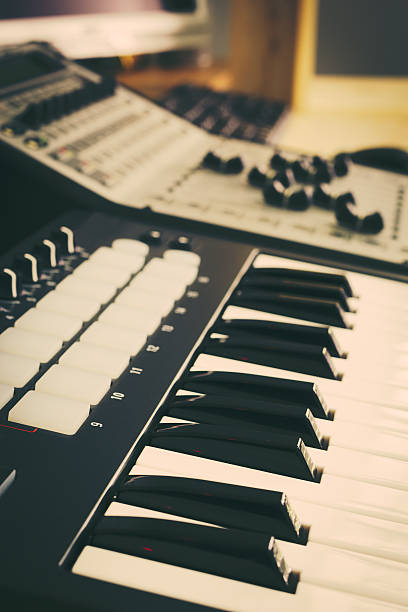 istock keyboard, piano, synthesizer & digital mixer in home studio 482391262