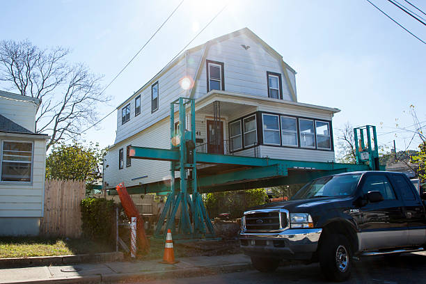 Hurricane Sandy - 1 Year Later Highlands Highlands, New Jersey - October 15, 2013: A house is raised off its foundation in the Highlands, New Jersey. Photo taken October 15, 2013, almost one year after Hurricane Sandy hit the eastern coast of the United States. superstorm stock pictures, royalty-free photos & images