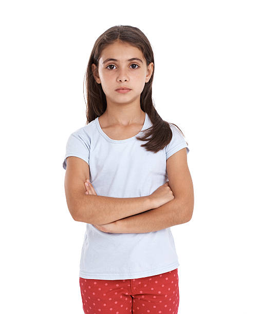 You mean you didn't get me a present? An unhappy girl isolated on whitehttp://195.154.178.81/DATA/i_collage/pu/shoots/805346.jpg sad child standing stock pictures, royalty-free photos & images