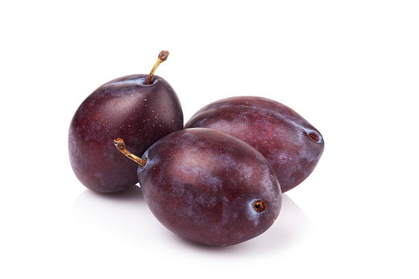 istock ripe prune or plum isolated on a white background. 482393136