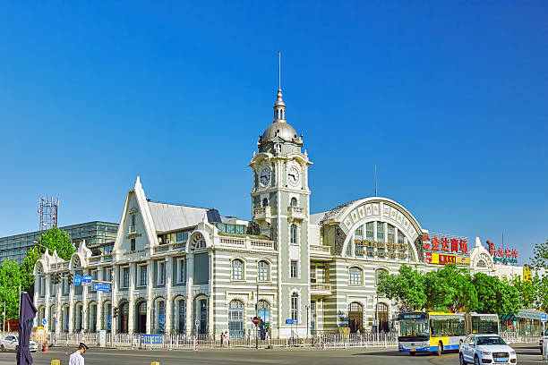 Beijing, China- May  19, 2015: People,  citizens of Beijing, walk  on Jingfeng Railway Zhengyang Mendong Station near Tiananmen Square.Beijing. China.
