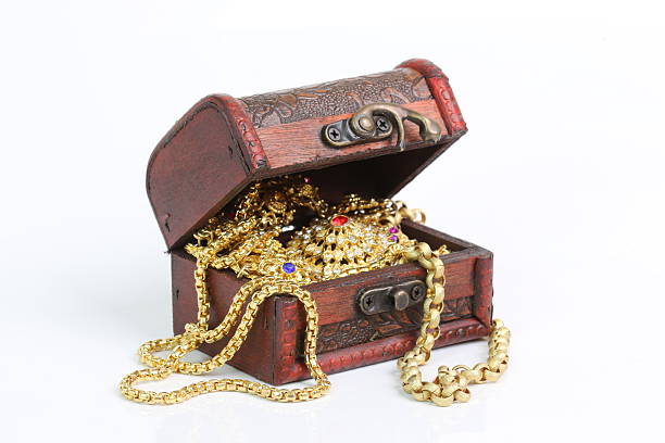 istock Treasure chest standing on wooden table 482397978