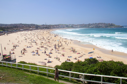 Sydney, Australia March 16TH 2013: People relaxing on Bondi beach. Bondi is one of the most famous beaches in the world.