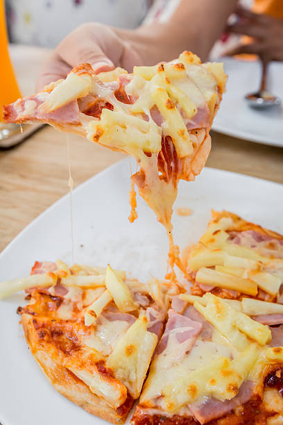 istock homemade pizza lifted slice 482398406