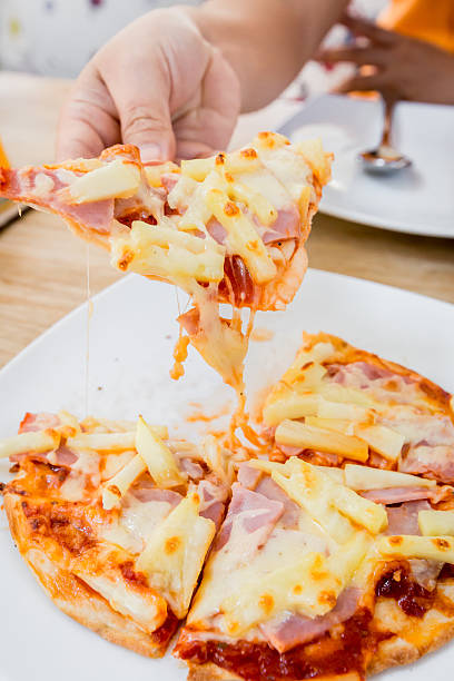istock homemade pizza lifted slice 482398408