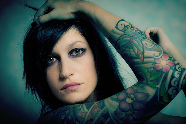 istock tattooed sensual woman portrait 482400094