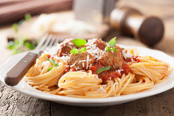 istock spaghetti with meatballs in tomato sauce 482402563