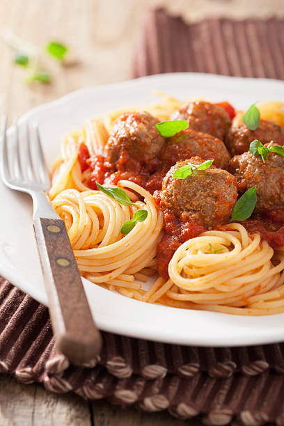 istock spaghetti with meatballs in tomato sauce 482402617